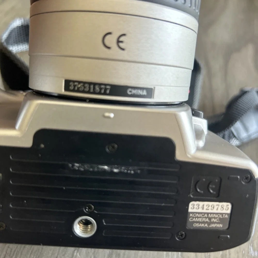 Minolta Dynax 30 Camera 28-10mm Lens Minolta Japan w/Straps UNTESTED FOR PARTS